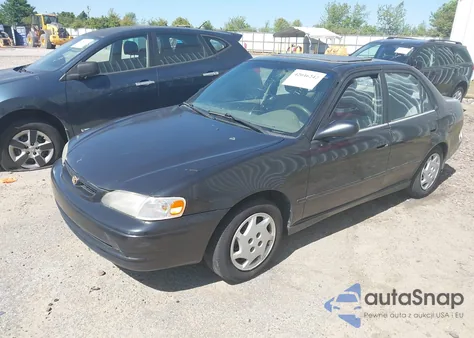 1998 Toyota Corolla Le z USA, uszkodzony, nr VIN 1NXBR18E2WZ118326